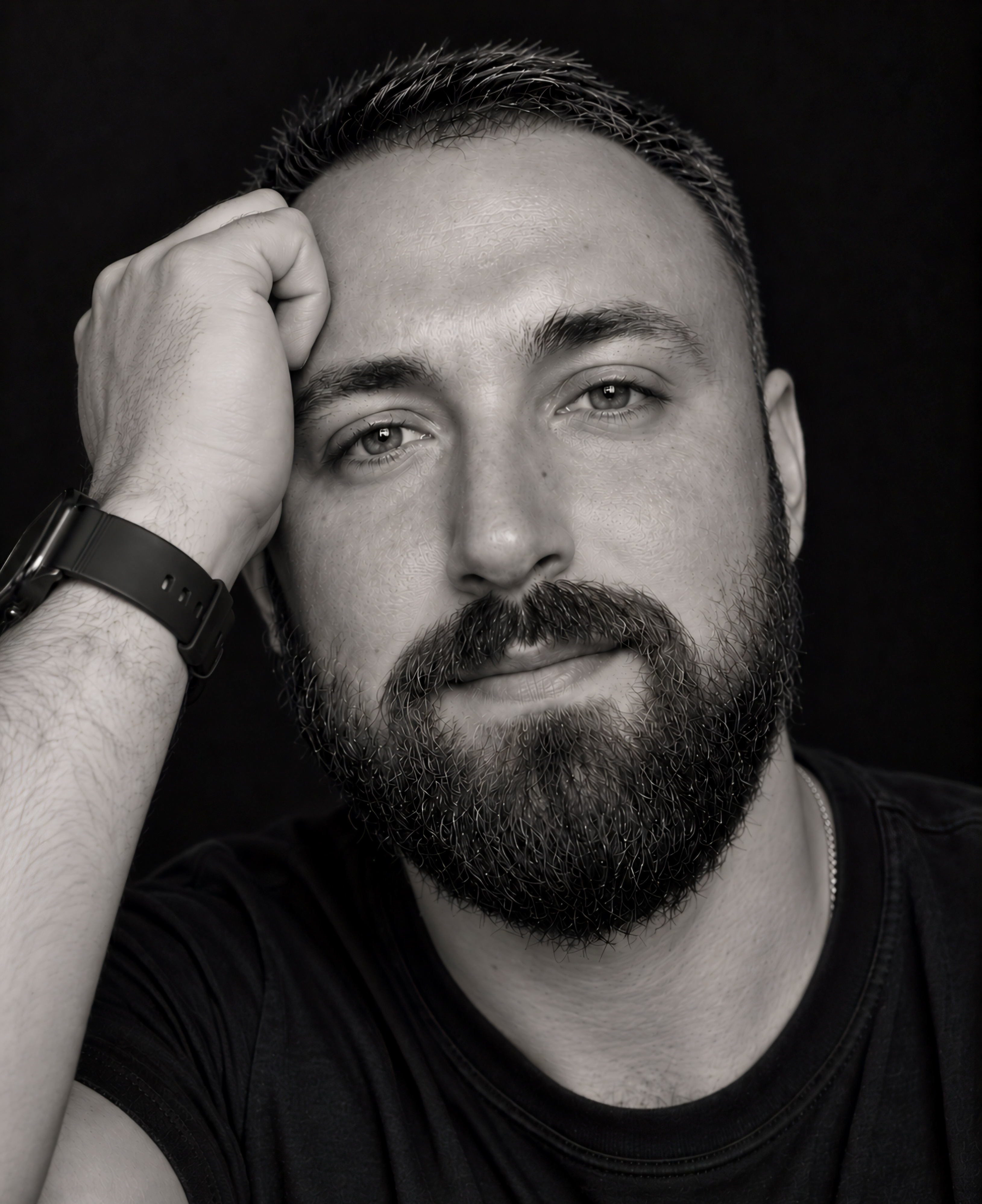 Black-and-white portrait of artist Volodymyr Sakhnik
