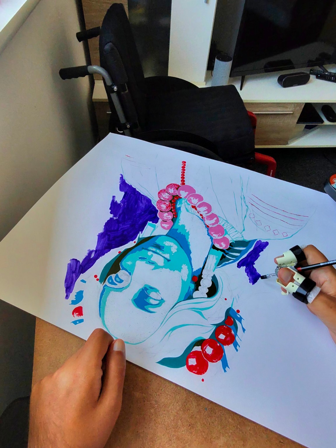 Working on a painting inspired by Ukrainian heritage
